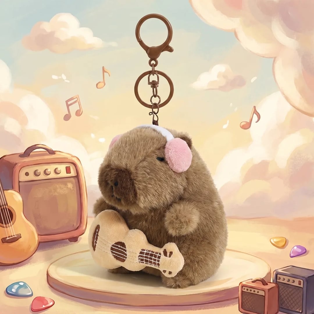 Guitar capybara keychain shown in an illustrated music themed scene