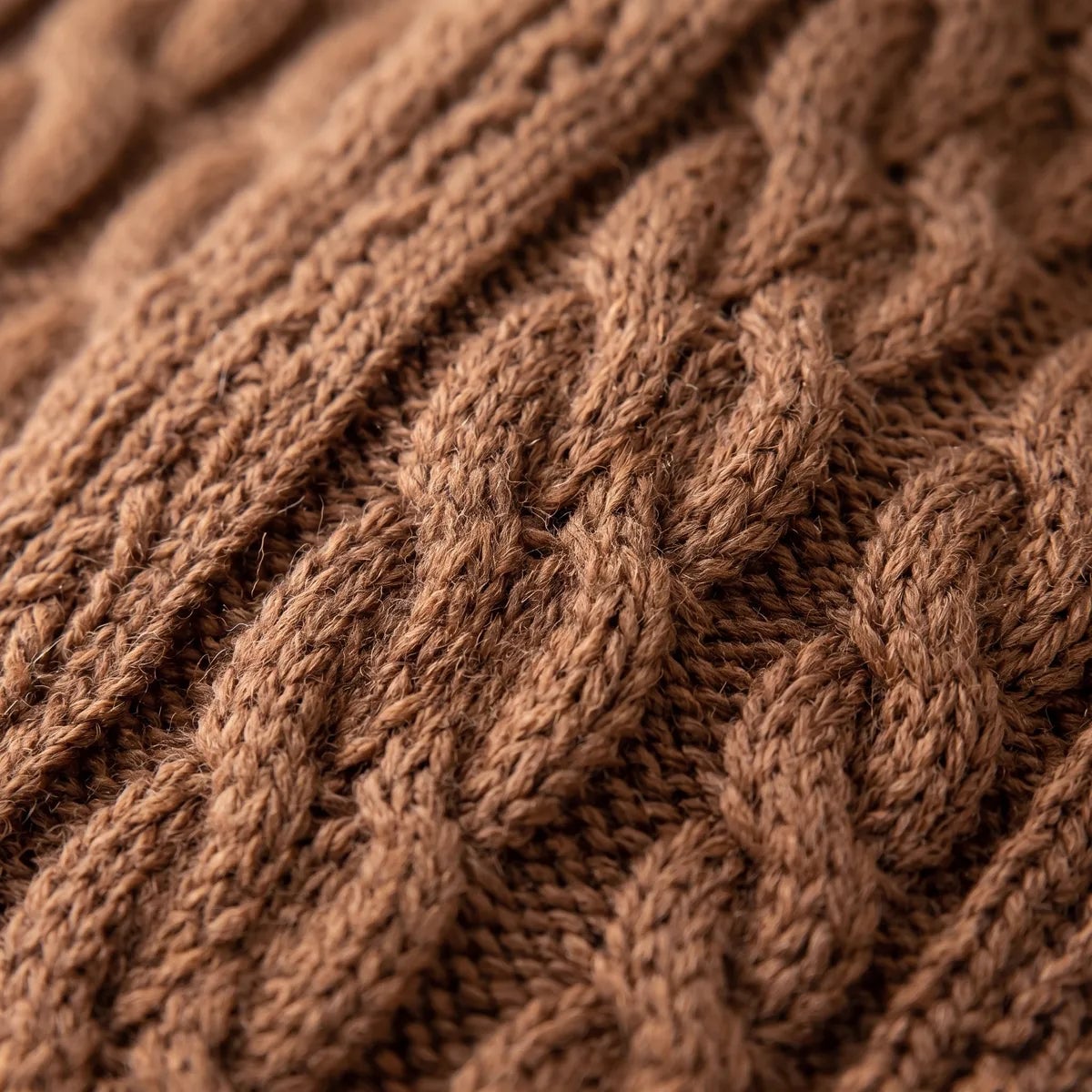 Macro of the brown cable knit used for the scarf capybara plush scarf