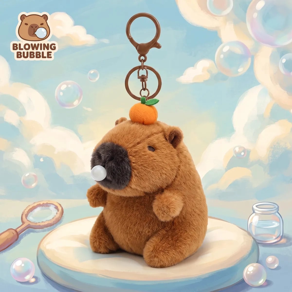 Illustrated artwork of the capybara blowing bubble keychain plush sitting on a cloud podium in a pastel sky full of soap bubbles, with a BLOWING BUBBLE badge in the corner